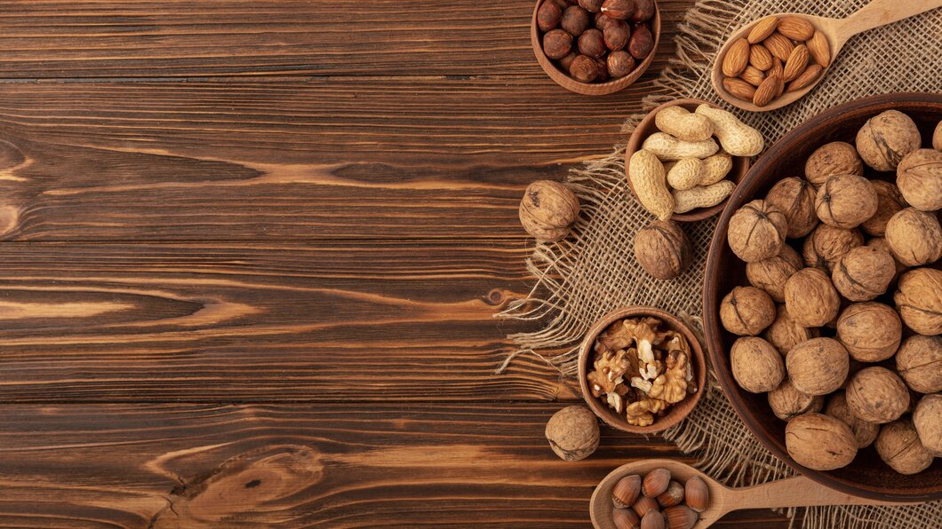 flat-lay-walnuts-bowl-with-other-variety-nuts-copy-space_23-2148452870